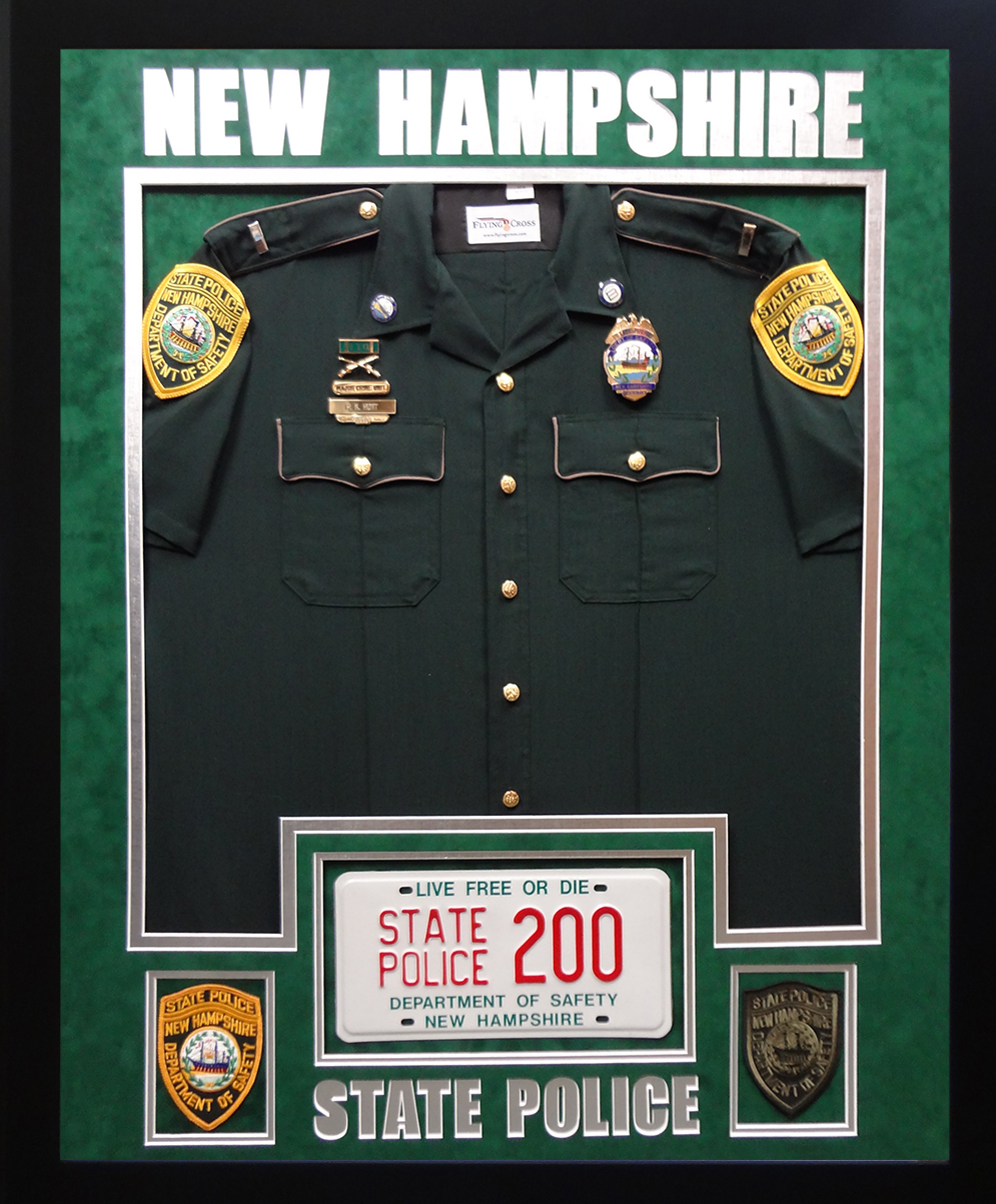 Custom Frame the uniform you provide with patches. New England Picture can frame any service uniform. The top mat has lettering cut out. You provide all the components you would like included in the framing and NEP will take it from there. Fill out the custom framing form and email us a picture of the item you want framed. The framing cost for a similar uniform is priced between $500-$700 depending on the details.